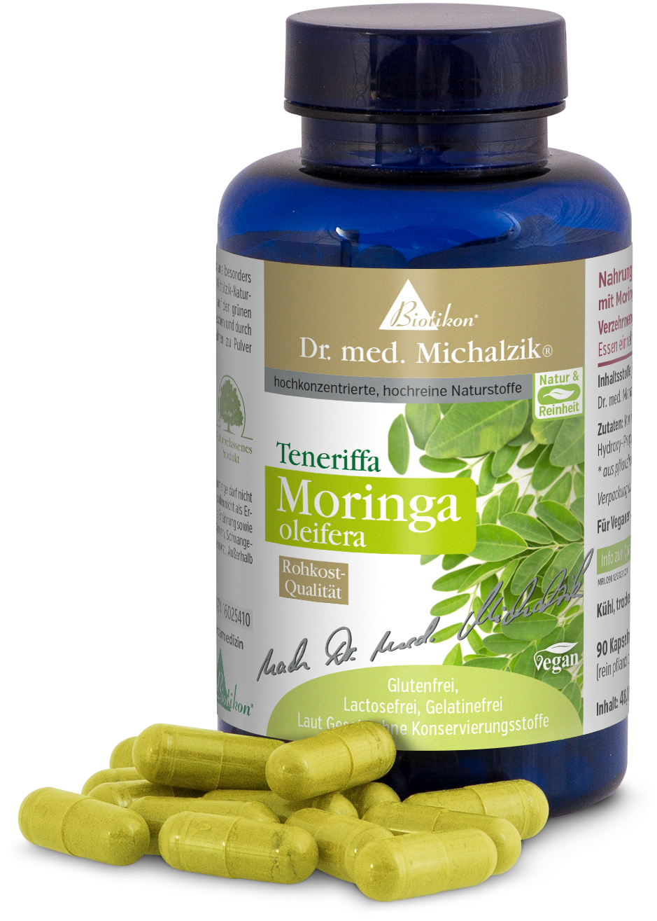 Moringa oleifera – 90 cápsulas Botella con cápsulas de Moringa oleifera, cápsulas verdes, 90 unidades, veganas, en botella azul.