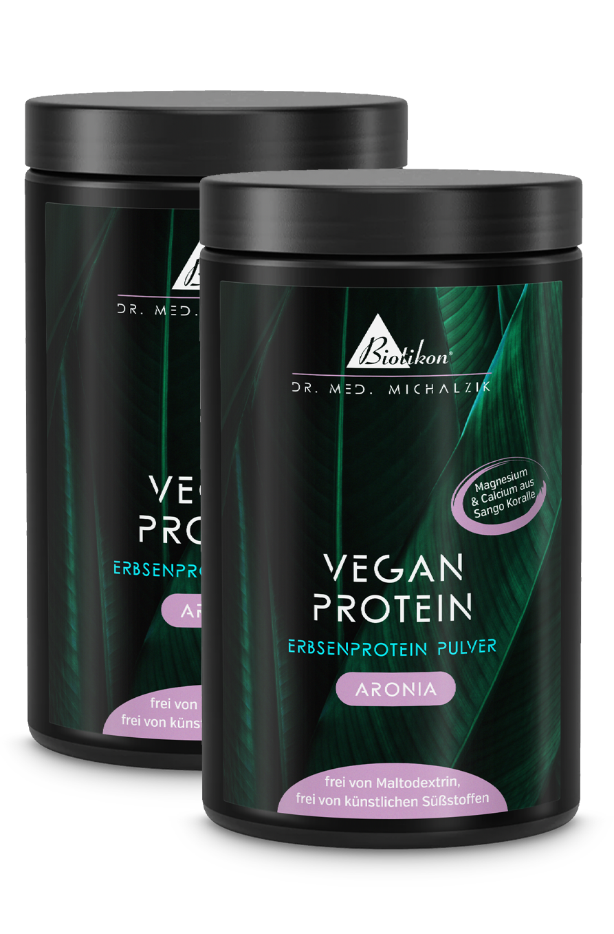 Dos envases de proteína vegetal en polvo blanca, etiqueta morada, 500 g.